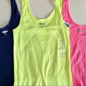 Three pack of lime/neon green, Navy, bright pink tank tops.